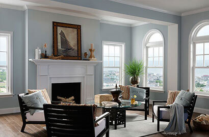 Room with Arched & Single Hung Windows